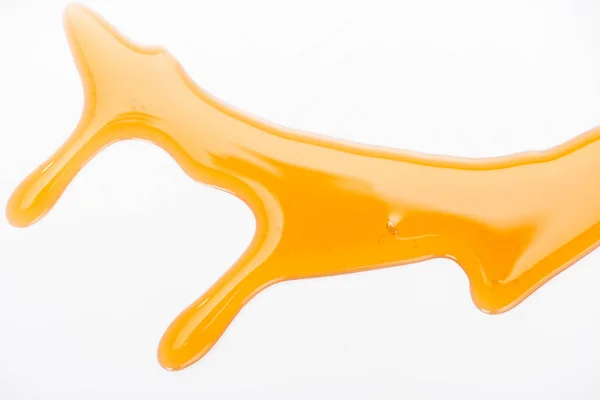 Крупним планом вид на дроблення солодкого меду ізольовані на білому — стокове фото
