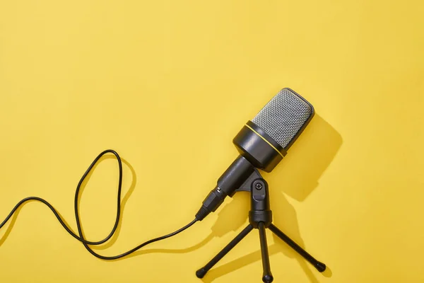 Top view of microphone on bright and colorful background — Stock Photo