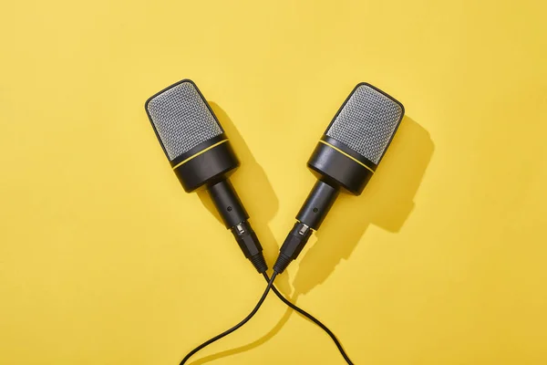 Top view of microphones on bright and colorful background — Stock Photo