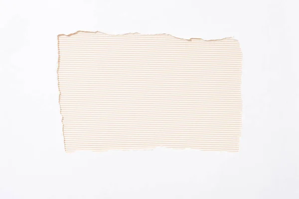 Beige striped colorful background in white torn paper hole — Stock Photo