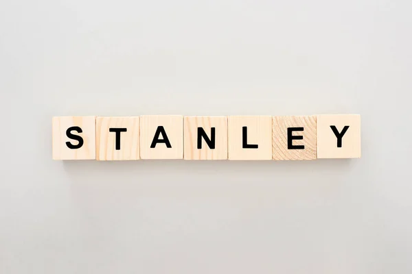 Top view of wooden blocks with Stanley lettering on white background — Stock Photo