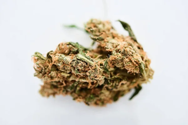 Close up view of natural marijuana bud isolated on white — Stock Photo