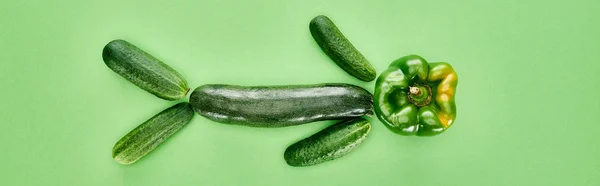 Panoramic shot of green and whole pepper, cucumbers and zucchini — Stock Photo