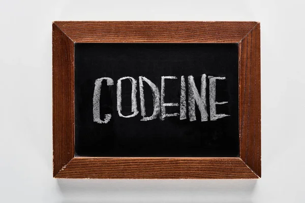 Top view of black chalk board with lettering codeine — Stock Photo