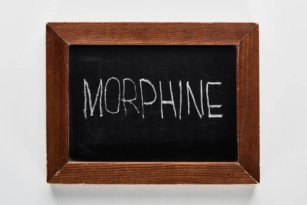 Top view of black chalk board with lettering morphine — Stock Photo