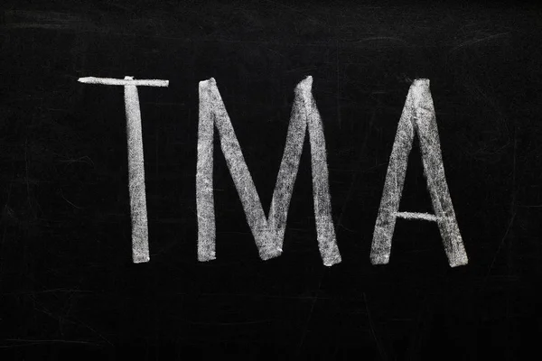 Top view of black chalk board with lettering tma — Stock Photo