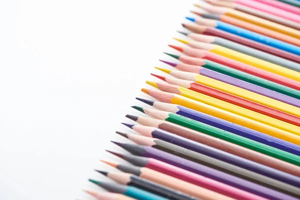 Selective focus of sharpened colored pencils on white — Stock Photo