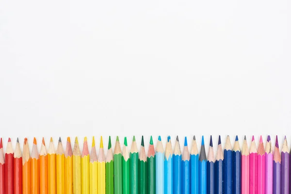 Rainbow spectrum made with sharpened color pencils isolated on white — Stock Photo