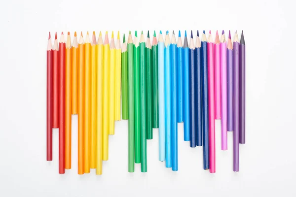 Rainbow spectrum made with sharpened color pencils isolated on white — Stock Photo