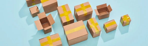 Panoramic shot of postal boxes on blue background with copy space — Stock Photo