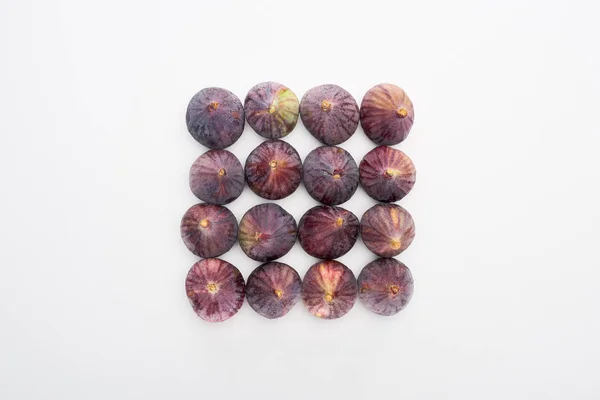 Flat lay with ripe whole delicious figs on white background — Stock Photo