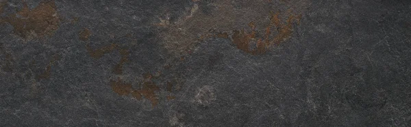 Panoramic shot of grey stone weathered texture — Stock Photo