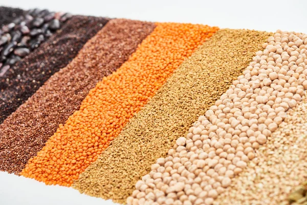 Black quinoa, buckwheat, lentil, chickpea and beans isolated on white — Stock Photo