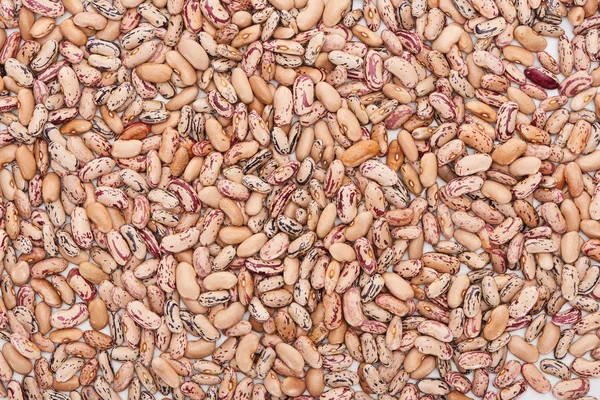 Vista superior de grãos de pinto inteiros não cozidos — Fotografia de Stock