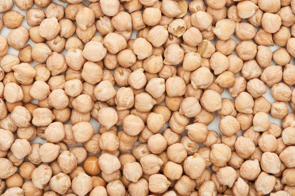 Top view of uncooked organic chickpea seeds — Stock Photo