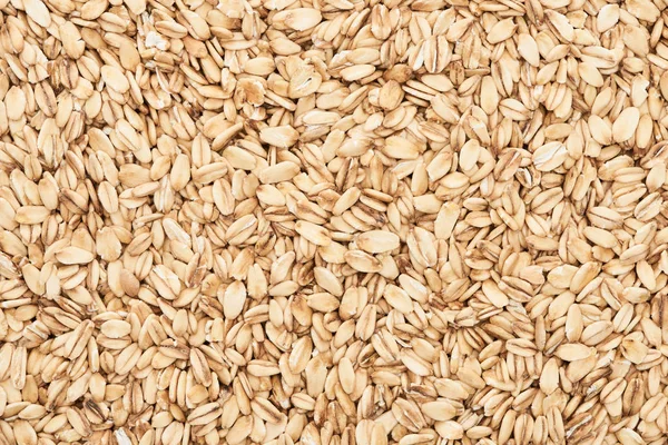 Vista superior de avena orgánica prensada cruda - foto de stock