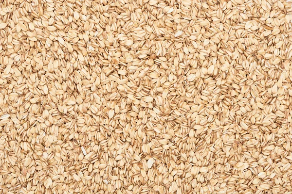 Vista superior de avena orgánica prensada sin cocer - foto de stock