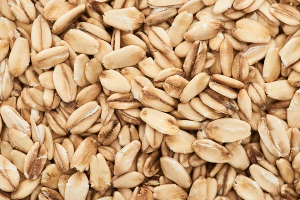 Top view of unprocessed pressed organic oats — Stock Photo