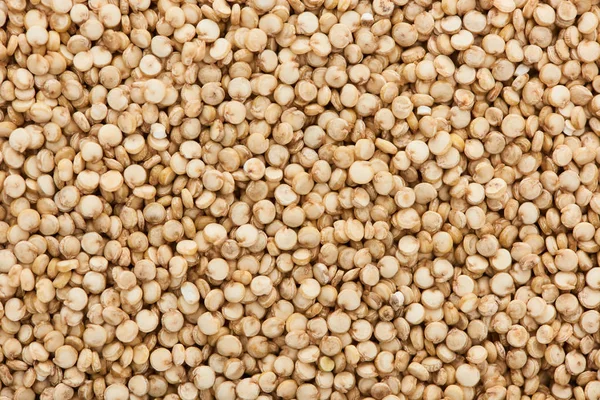 Vista superior de pequeñas semillas de quinua blanca - foto de stock