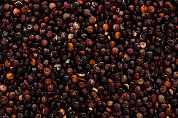 Vue du dessus du quinoa noir biologique non transformé — Photo de stock