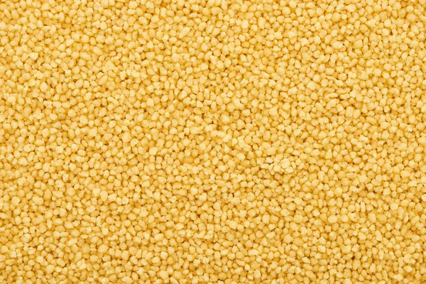 Draufsicht auf rohe Bio-Couscous-Grütze — Stockfoto