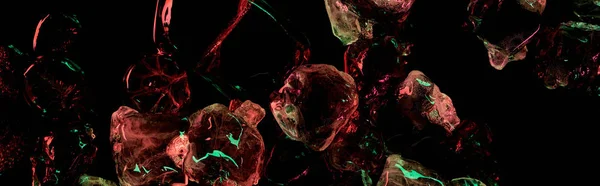 Panoramic shot of clear ice cubes with red and green colorful lighting isolated on black — Stock Photo