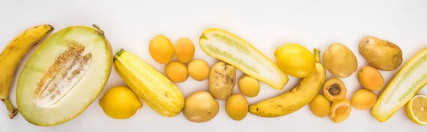 Top view yellow season fruits and vegetables on white background — Stock Photo