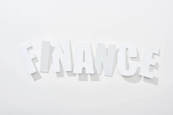 Top view of finance inscription on white background — Stock Photo