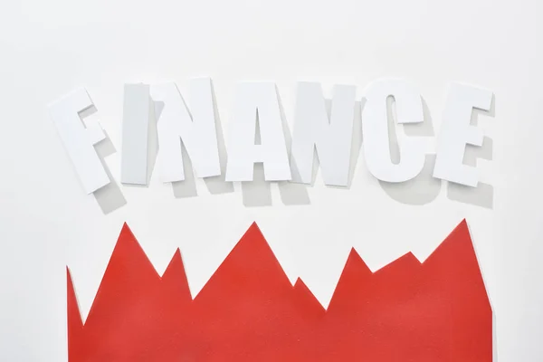 Top view of finance inscription with red statistic graph on white background — Stock Photo