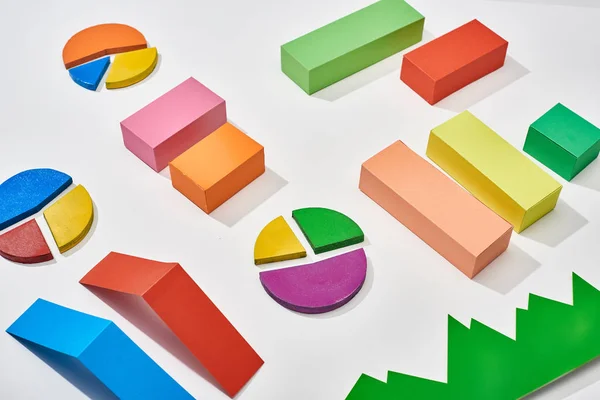 Color blocks and pie charts with shadow on white background — Stock Photo