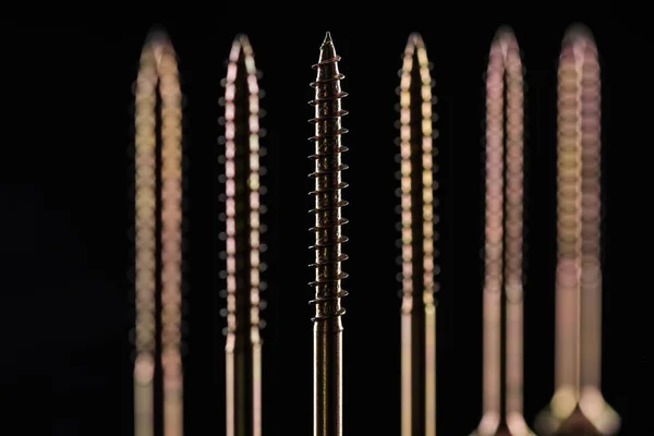 Close up view of screw points isolated on black — Stock Photo