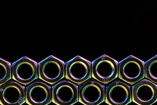 Seamless shiny steel screws pattern isolated on black — Stock Photo