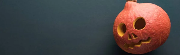 Panoramic shot of Halloween pumpkin on black background — Stock Photo