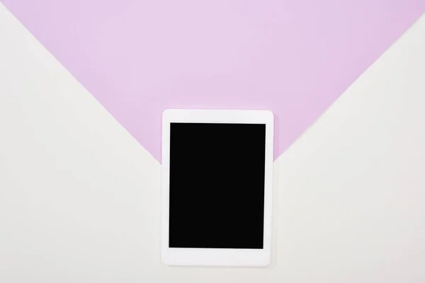 Top view of digital tablet with blank screen on violet and white background — Stock Photo