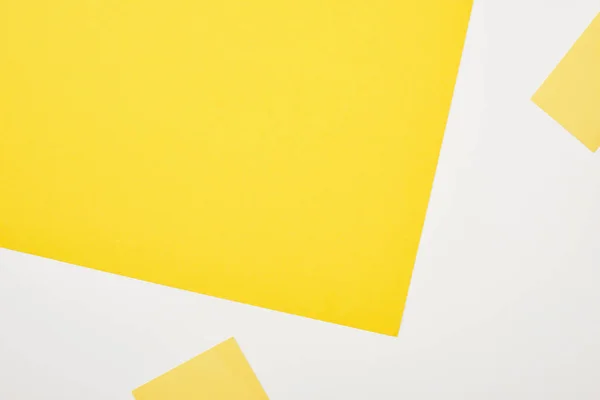 Top view of geometric yellow and white background — Stock Photo