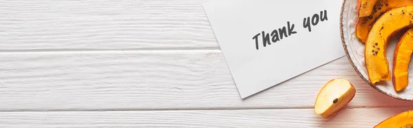 Top view of thank you card on wooden white table with apples and pumpkin, panoramic shot — Stock Photo