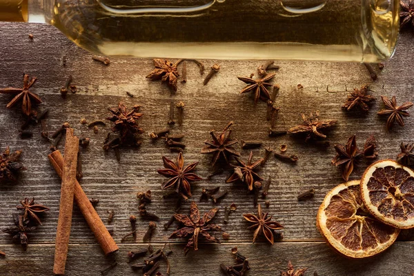 Top view of white wine and spices on wooden rustic table — Stock Photo