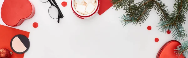 Coffee with marshmallow, fir branch, heart-shaped gift boxes, face powder, glasses, red paper isolated on white — Stock Photo