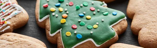 Close up view of delicious glazed Christmas tree cookie, panoramic shot — Stock Photo