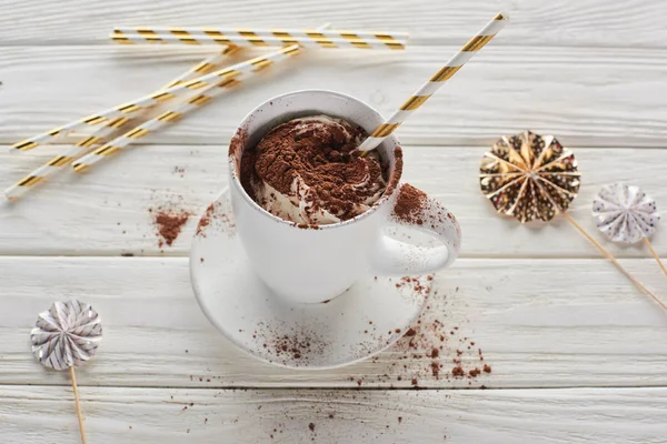 Christmas cacao in mug with decoration on white wooden table — Stock Photo