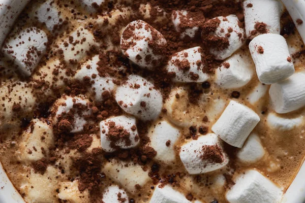 Top view of cacao with marshmallow and cacao powder in mug — Stock Photo