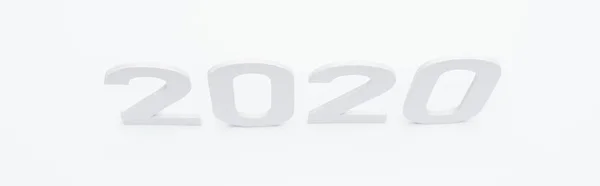Draufsicht auf Papier 2020 Zahlen auf weißem Hintergrund, Panoramaaufnahme — Stockfoto