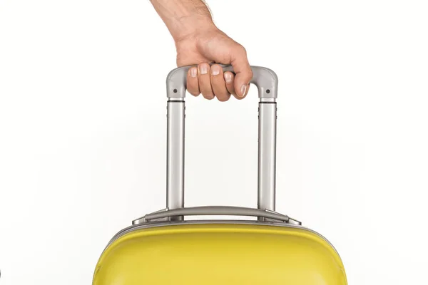 Cropped view of man holding travel bag on white background — Stock Photo