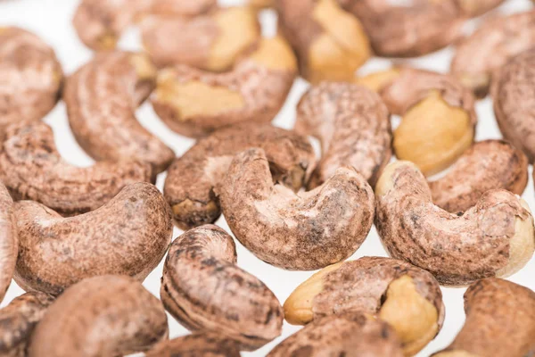 Close up view of cashew nuts isolated on white — Stock Photo