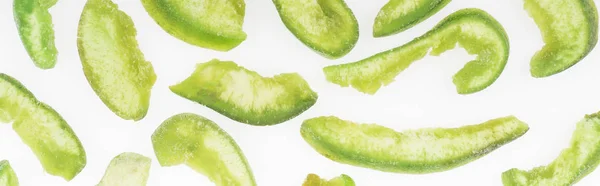 Draufsicht auf grüne zuckerhaltige kandierte Früchte isoliert auf weißem, panoramischem Foto — Stockfoto