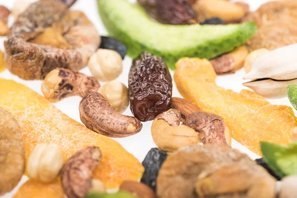 Close up view of Turkish assorted nuts, dried fruits and candied fruit isolated on white — Stock Photo