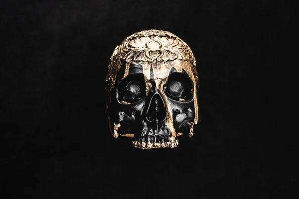 Top view of occult voodoo skull on black — Stock Photo