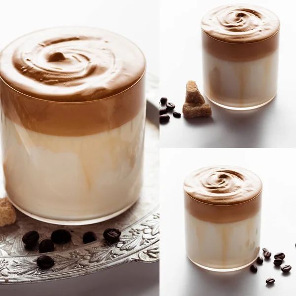 Colagem de delicioso café Dalgona em vidro perto de grãos de café e açúcar granulado marrom na bandeja de prata no fundo branco — Fotografia de Stock