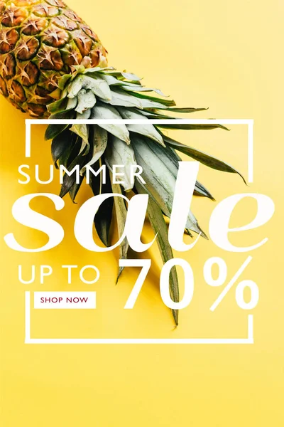 Fresh ripe pineapple with green leaves on yellow background with summer sale illustration — Stock Photo