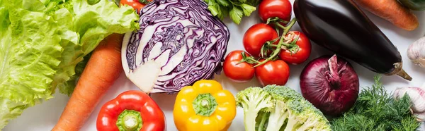 Top view of assorted fresh vegetables on white background — Stock Photo